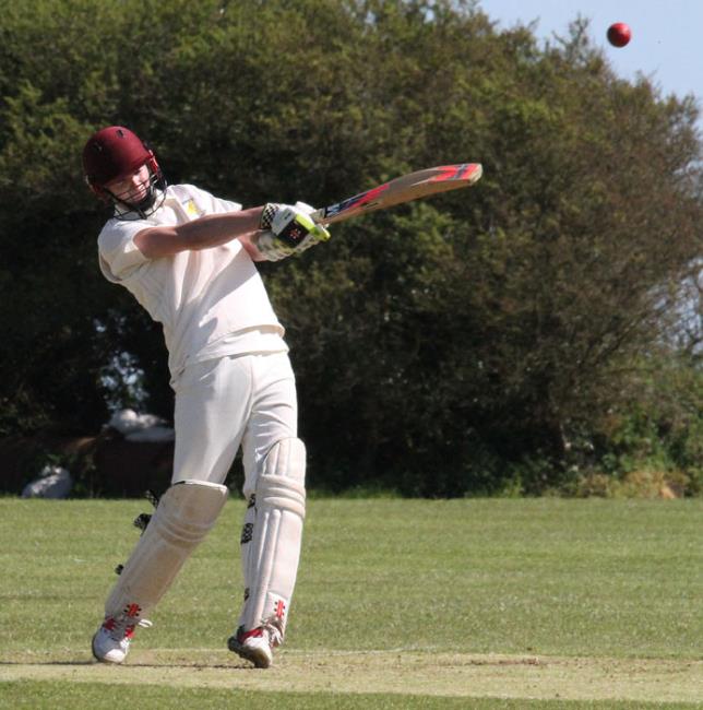 Tom Cole hits another boundary on   his way to a half-century.